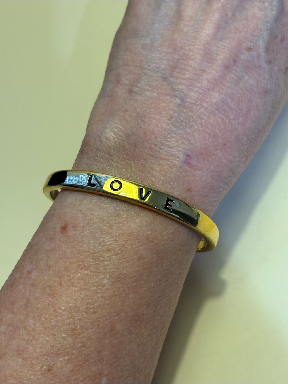 Kinsley Armelle Gold 'LOVE' Open Cuff Bracelet